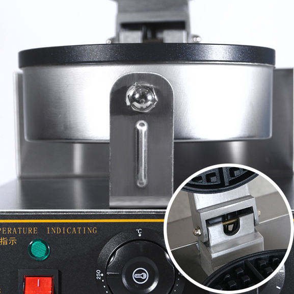 Close-up of the locking clamp mechanism on the Belgian waffle maker