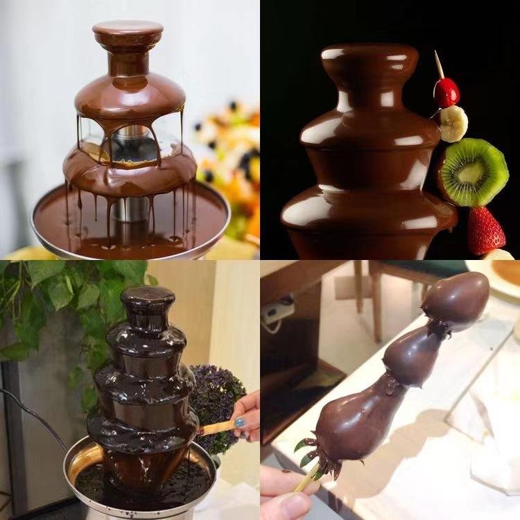 Chocolate fountain flowing with fruit skewers dipped in chocolate