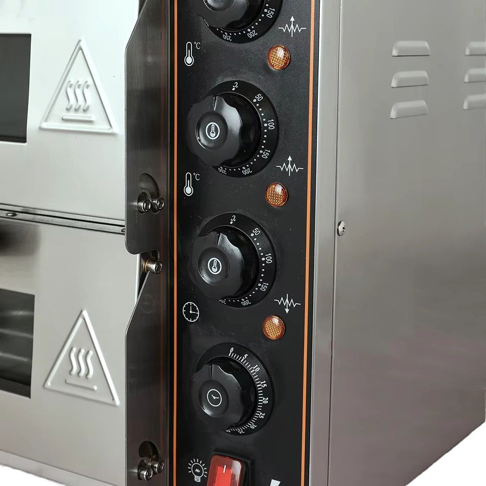 Pizza oven control panel with dual temperature and timer knobs